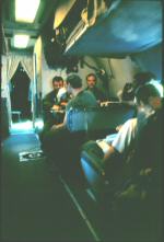 Several crewmen are at the forward galley table of on of VW-1's WC-121 / WV-2. 