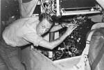 Radar Tech tunes up the APS-20 radar receiver in one of VW-1's WV-2 aircraft