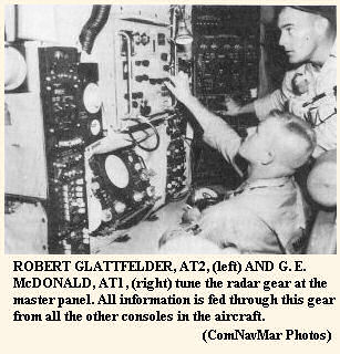 ROBERT GLATTFELDER, AT2, (left) AND G. E. McDONALD, AT1, (right) tune the radar gear at the master panel.