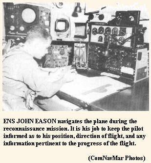 ENS JOHN EASON navigates the plane during the Typhoon Karen reconnaissance mission. 