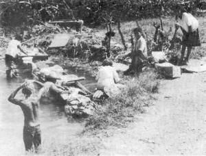 Tyhoon Karen aftermath, Guamanians doing laundry at Agana Springs.