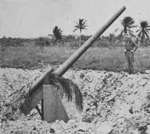 Dummy gun with barrel of canvas-covered wood